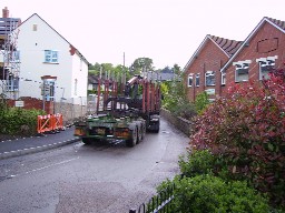 Heavy lorry negotiating the bend by Millhayes